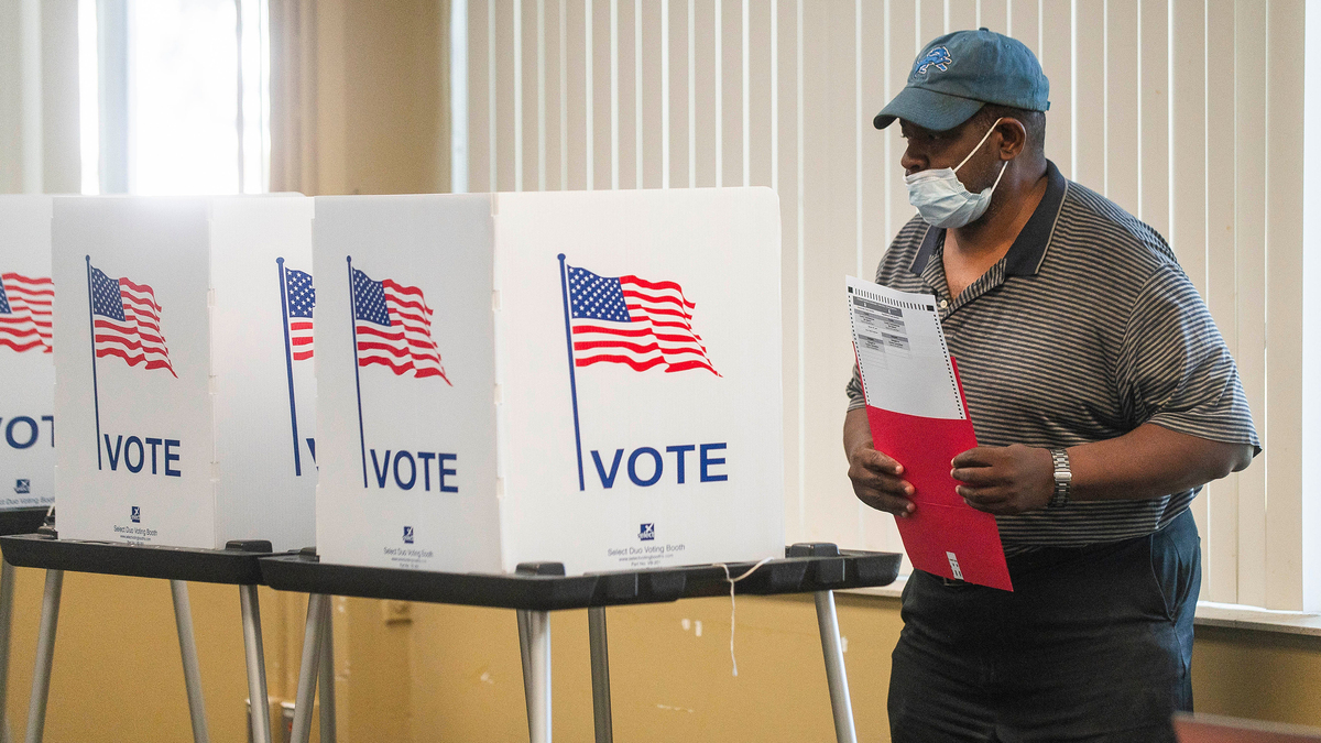 A voter completes his ballot during early voting at the Northwest Activities Center on July 27, 2024, in Detroit. (Katy Kildee/The Detroit News/TNS)