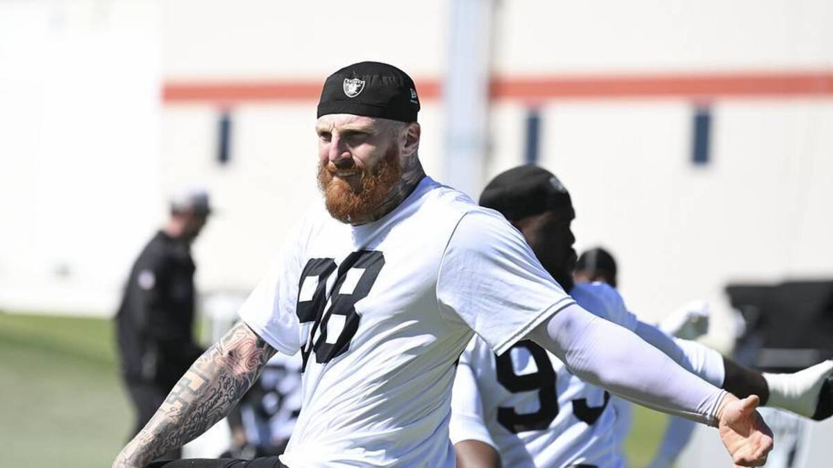  May 28, 2026; Henderson, NV, USA; Las Vegas Raiders defensive end Maxx Crosby (98) stretches during organized team activities at Intermountain Health Performance Center. Mandatory Credit: Candice Ward-Imagn Images | Candice Ward-Imagn Images 