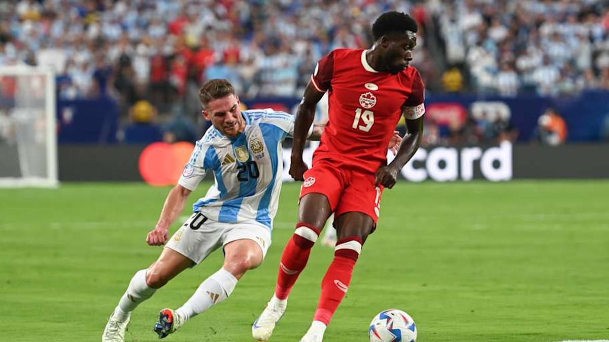  Alphonso Davies led Canada into the 2024 Copa América with the red kit against Argentina | Stephen Nadler/ISI Photos/Getty Images 