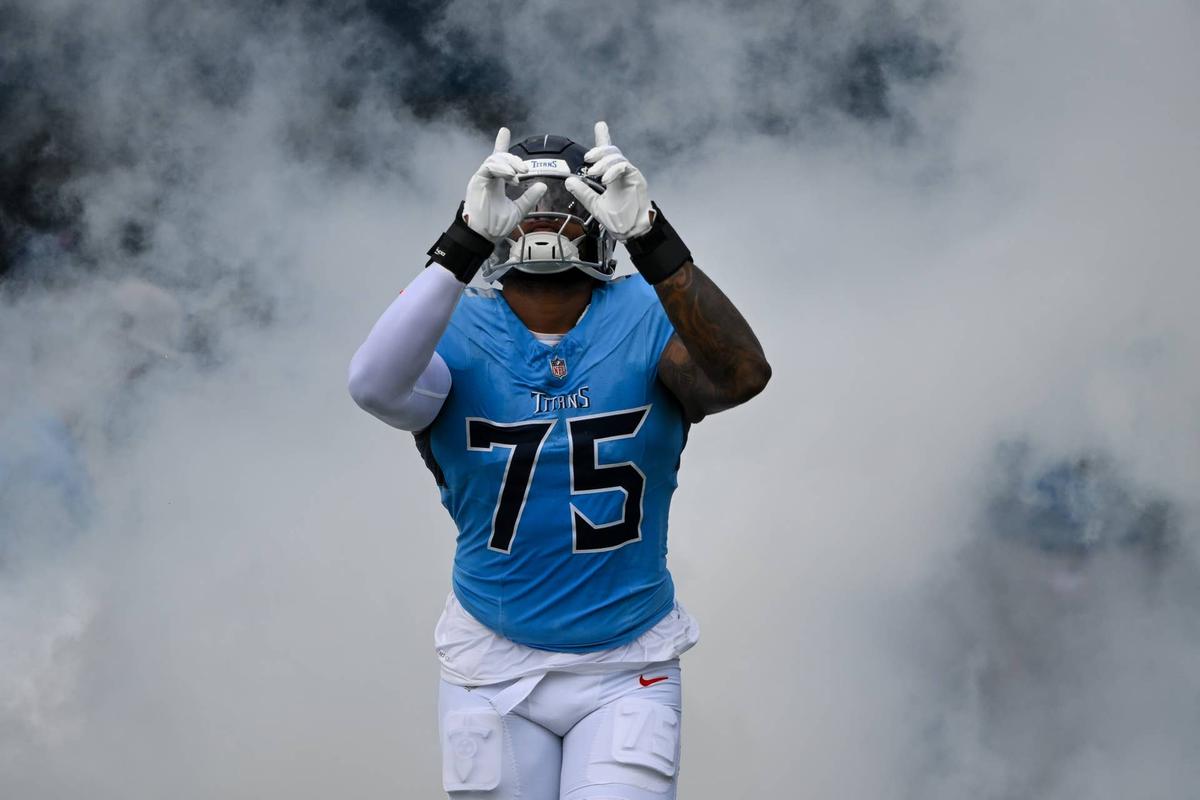 Tennessee Titans offensive tackle Dan Moore Jr. takes the field at Nissan Stadium. Steve Roberts-Imagn Images