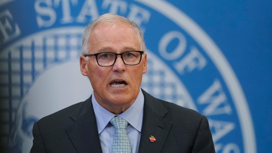Washington Gov. Jay Inslee speaks at a news conference, Wednesday, Aug. 18, 2021, at the Capitol in Olympia, Wash. Inslee announced that Washington state is expanding its vaccine mandate to include all public, charter and private school teachers and staff, as well as those working at the state’s colleges and universities. Inslee also expanded the statewide indoor mask mandate in place for non-vaccinated individuals to include those who are vaccinated. (AP Photo/Ted S. Warren)