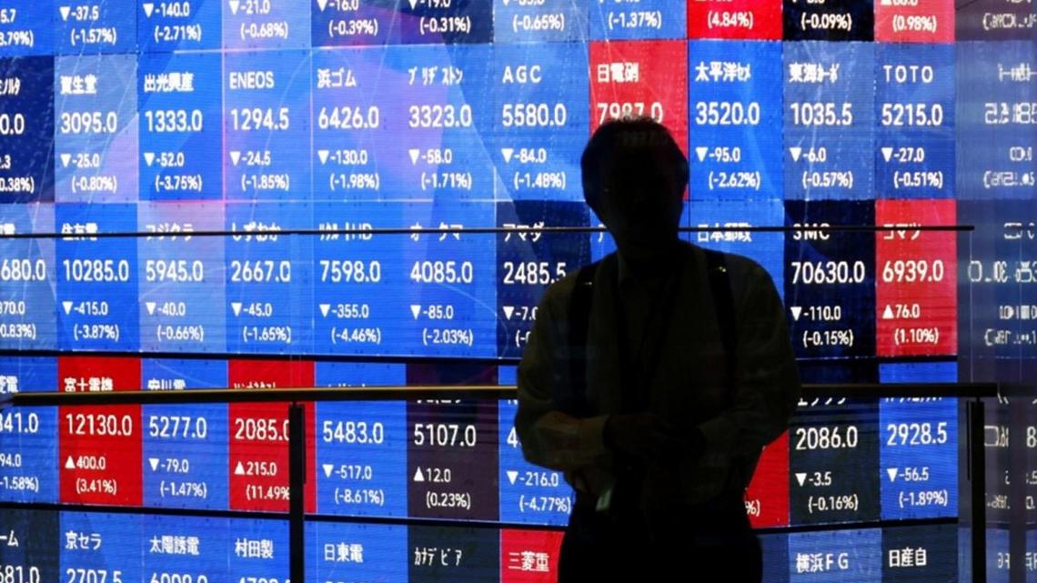 Japan's Nikkei briefly tops 60,000 for first time 