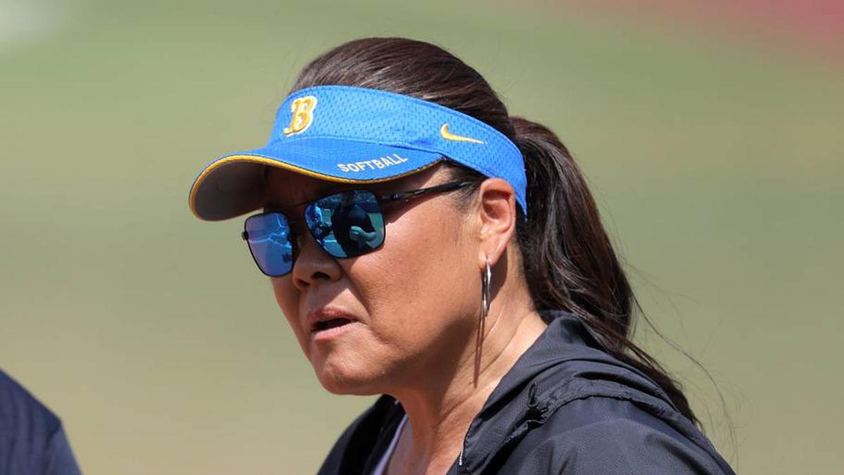  UCLA coach Kelly Inouye-Perez talks with an official during a Women's College World Series softball game between the University of Oklahoma Sooners (OU) and the UCLA Bruins at Devon Park in Oklahoma City, Saturday, June 1, 2024. Oklahoma won 1-0. | BRYAN TERRY/THE OKLAHOMAN / USA TODAY NETWORK 