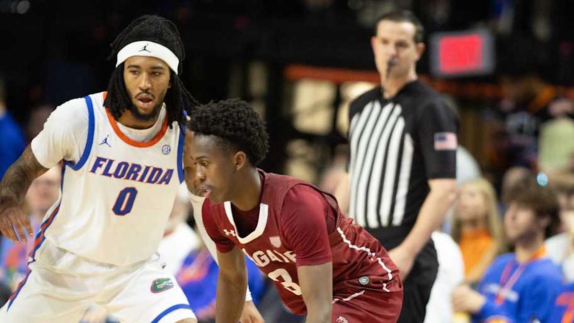  Colgate guard Jalen Cox (3) drives past Florida guard Boogie Fland (0) during the second half of an NCAA mens basketball game at Steven C. O'Connell Center Exactek arena in Gainesville, FL on Sunday, December 21, 2025. Florida won 90-60. [Alan Youngblood/Gainesville Sun] | Alan Youngblood/Gainesville Sun / USA TODAY NETWORK via Imagn Images 