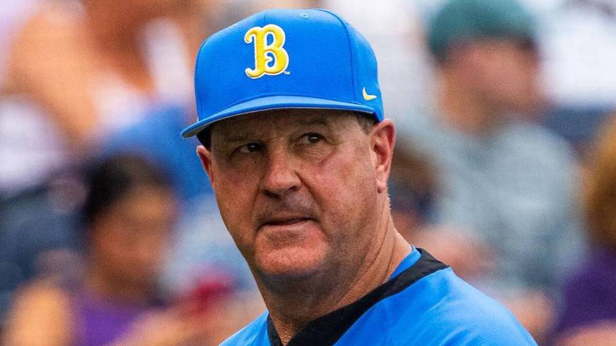  Jun 16, 2025; Omaha, Neb, USA; UCLA Bruins head coach John Savage walks off the field before the game against the LSU Tigers at Charles Schwab Field. Mandatory Credit: Dylan Widger-Imagn Images | Dylan Widger-Imagn Images 