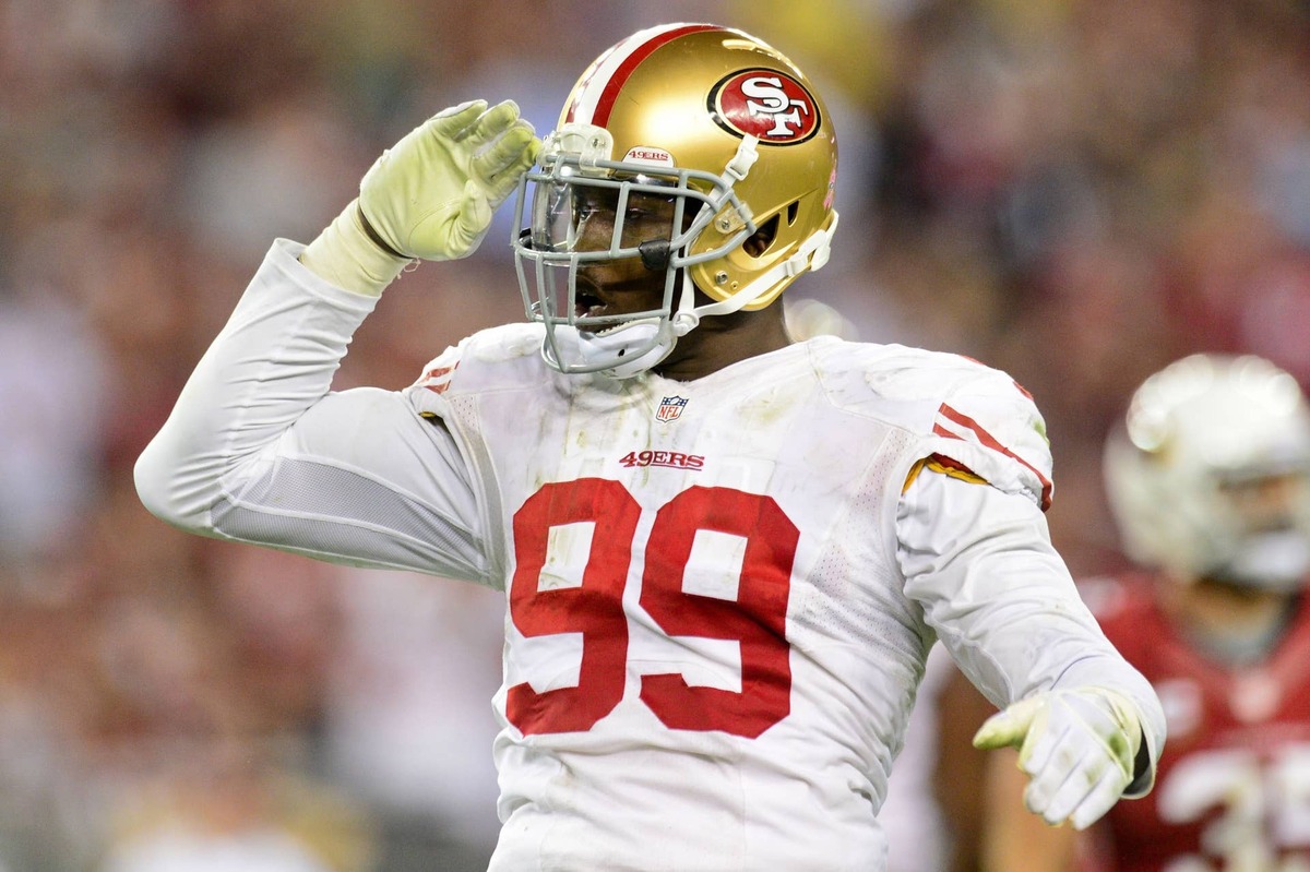  Oct 29, 2012; Glendale, AZ, USA; San Francisco 49ers outside linebacker Aldon Smith (99) celebrates after sacking Arizona Cardinals quarterback John Skelton (19) during the second half at University of Phoenix Stadium. The 49ers beat the Cardinals 24-3. Mandatory Credit: Matt Kartozian-USA TODAY Sports 
