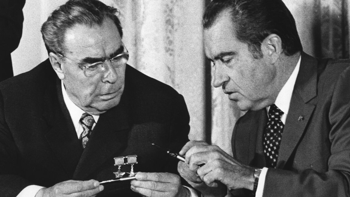 President Richard Nixon and Soviet Communist Party Chief Leonid Brezhnev exchange pens used in signing an agreement on June 22, 1973, to avoid military confrontations and threats of force that might trigger nuclear war. The ceremony was in the East Room of the White House in Washington. File Photo by Frank Cancellare/UPI