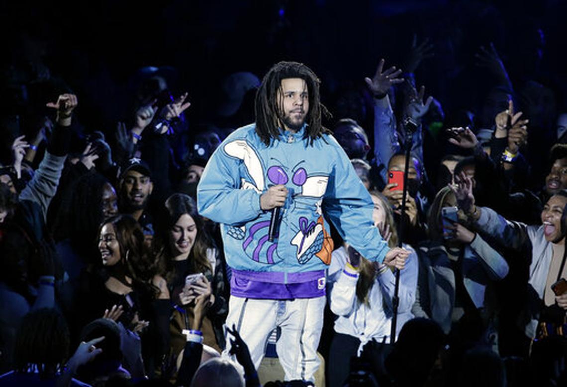 Rapper J. Cole performs at halftime during NBA All-Star basketball game, Sunday, Feb. 17, 2019, in Charlotte, N.C.