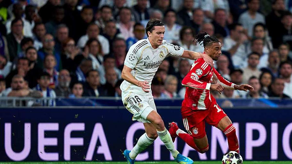  Álvaro Carreras (left) struggled against Michael Olise in the Champions League. | Diego Souto/Getty Images 