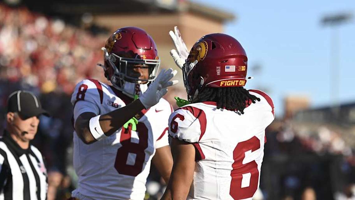  Oct 19, 2024; College Park, Maryland, USA; Southern California Trojans wide receiver Ja'Kobi Lane (8) celebrates with Trojans wide receiver Makai Lemon (6) after scoring first half touchdown against the Maryland Terrapins at SECU Stadium. Mandatory Credit: Tommy Gilligan-Imagn Images | Tommy Gilligan-Imagn Images 