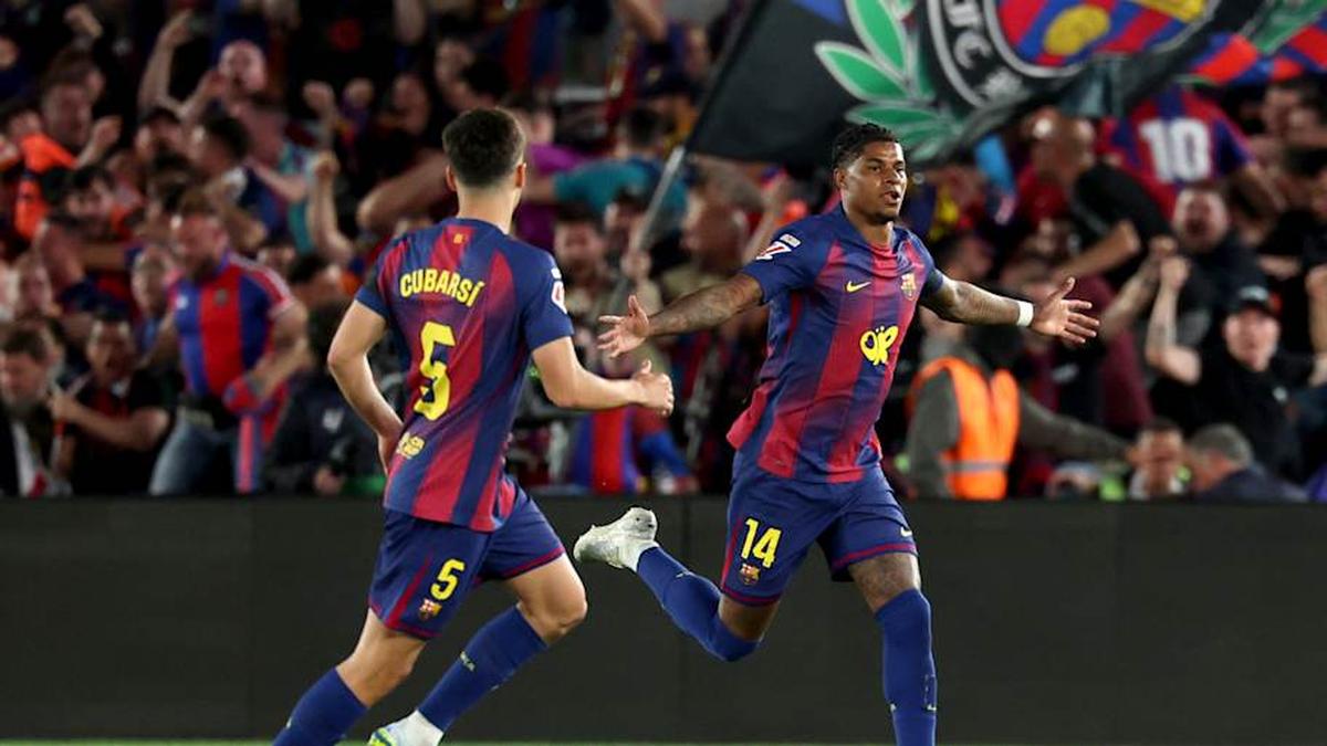 Marcus Rashford (right) scored a cracking goal. | Lluis Gene/AFP/Getty Images 