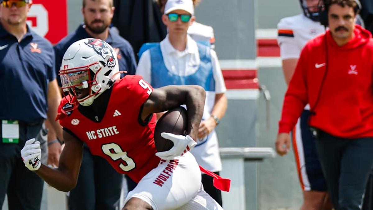  Sep 6, 2025; Raleigh, North Carolina, USA; North Carolina State Wolfpack wide receiver Terrell Anderson (9) runs with the football during the first half of the game against Virginia Cavaliers at Carter-Finley Stadium. Mandatory Credit: Jaylynn Nash-Imagn Images | Jaylynn Nash-Imagn Images 
