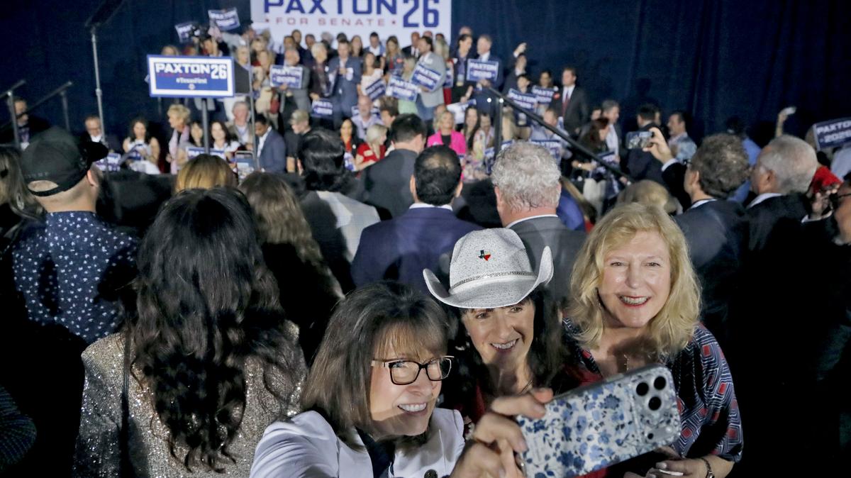 Lori Kritman (center) takes a selfie at a watch party for Attorney General Ken Paxton at the Dallas/Plano Marriott at Legacy Towncenter on May 26, 2026, in Plano, Texas. Paxton defeated Sen. John Cornyn (R-TX) in a Senate primary runoff election and will face Democrat James Talarico in the November general election.