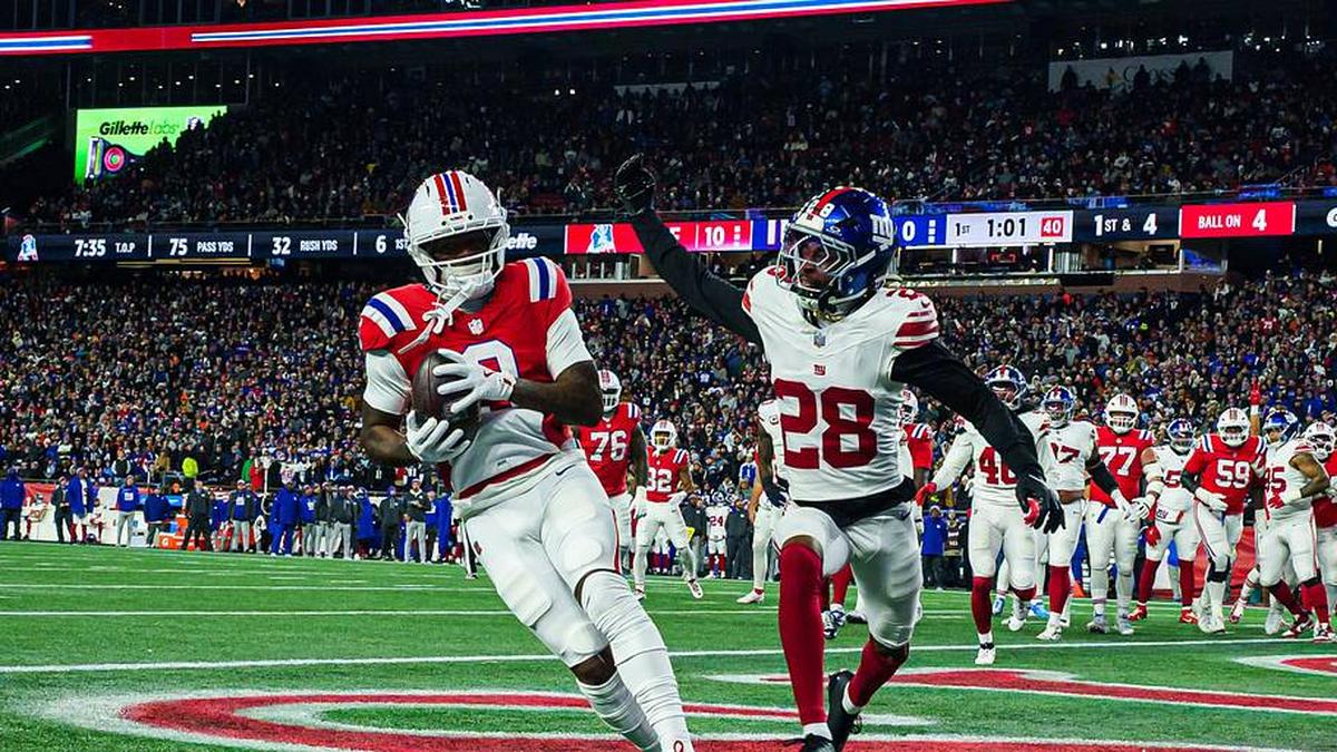  Dec 1, 2025; Foxborough, Massachusetts, USA; New England Patriots wide receiver Kayshon Boutte (9) catches a pass for a touchdown against New York Giants cornerback Cor'Dale Flott (28) during the first quarter at Gillette Stadium. Mandatory Credit: David Butler II-Imagn Images | David Butler II-Imagn Images 