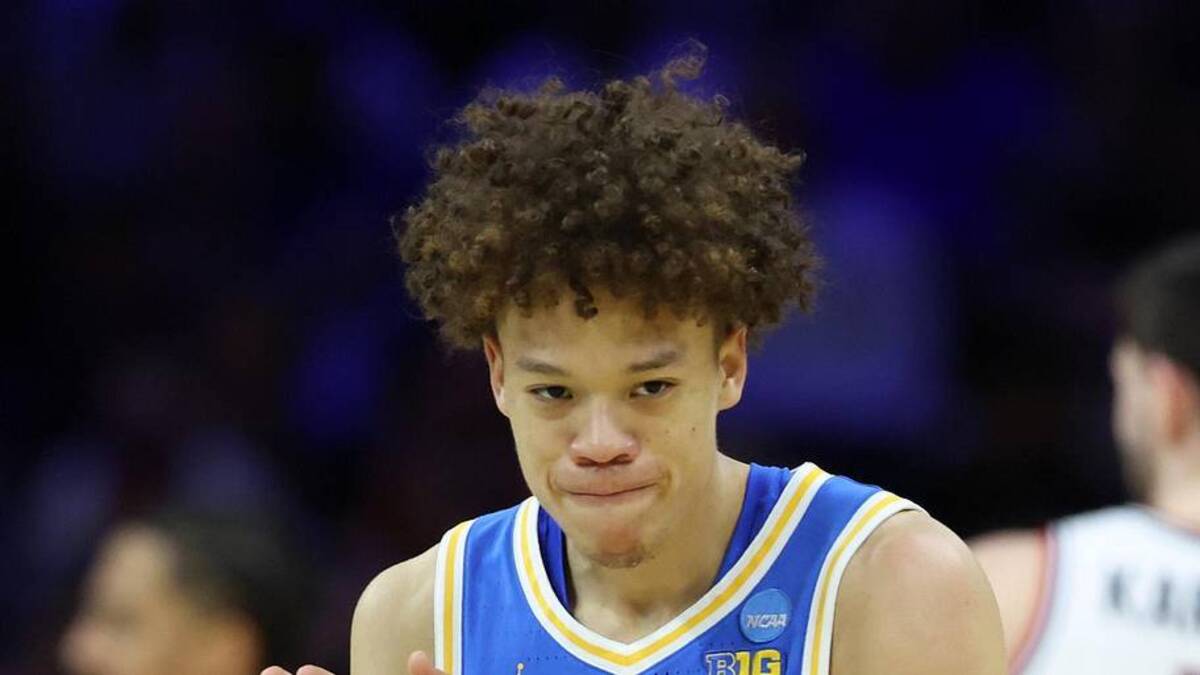  Mar 22, 2026; Philadelphia, PA, USA; UCLA Bruins guard Trent Perry (0) reacts against the UConn Huskies in the first half during a second round game of the men's 2026 NCAA Tournament at Xfinity Mobile Arena. Mandatory Credit: Bill Streicher-Imagn Images | Bill Streicher-Imagn Images 