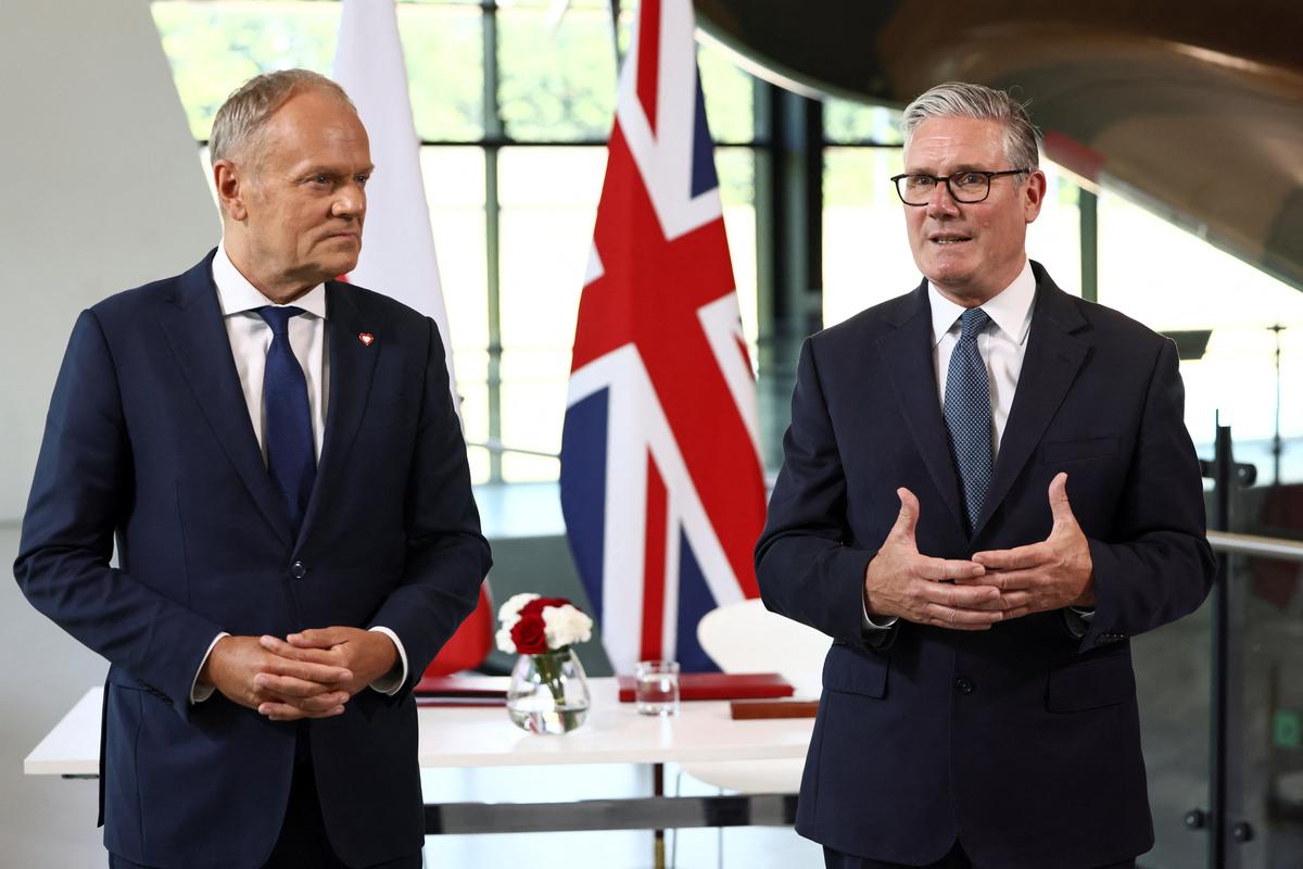 Britain's Prime Minister Keir Starmer and Poland's Prime Minister Donald Tusk attend a signing ceremony of a UK-Poland defence and security treaty at the Battle of Britain Bunker in Uxbridge, Britain, May 27, 2026. REUTERS/Jack Taylor/Pool