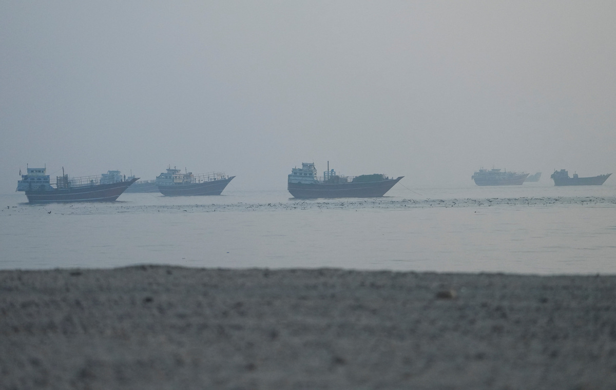 Vessels in the Strait of Hormuz, as seen from Musandam, Oman, June 15, 2026. REUTERS/Stringer