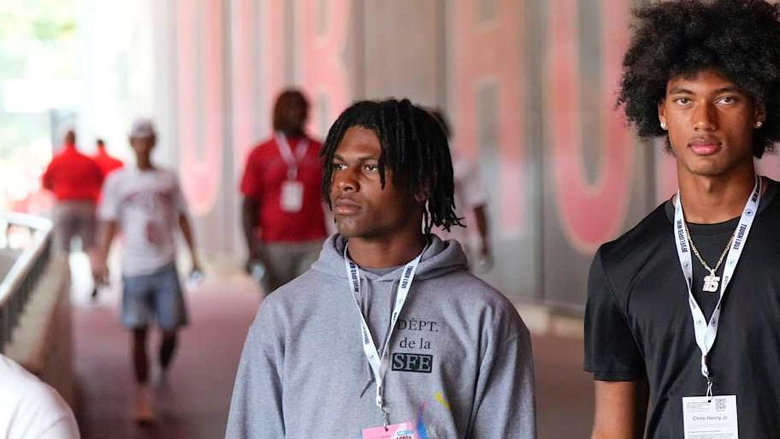  Aug 31, 2024; Columbus, OH, USA; Ohio State Buckeyes recruits Kayden Dixon-Wyatt and Chris Henry Jr. walk onto the field prior to the NCAA football game against the Akron Zips at Ohio Stadium. Ohio State won 52-6. | Adam Cairns/Columbus Dispatch / USA TODAY NETWORK via Imagn Images 