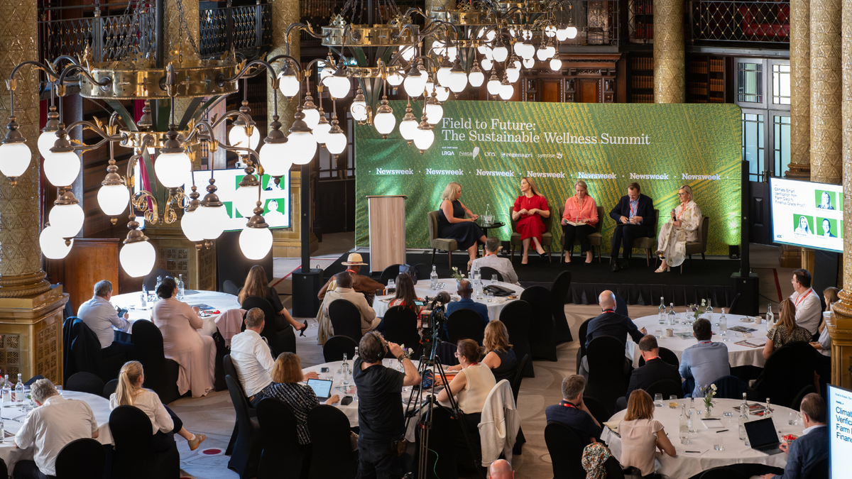 An overhead view of the crowd and stage at Newsweek's Field to Future: The Sustainable Wellness Summit 2026.