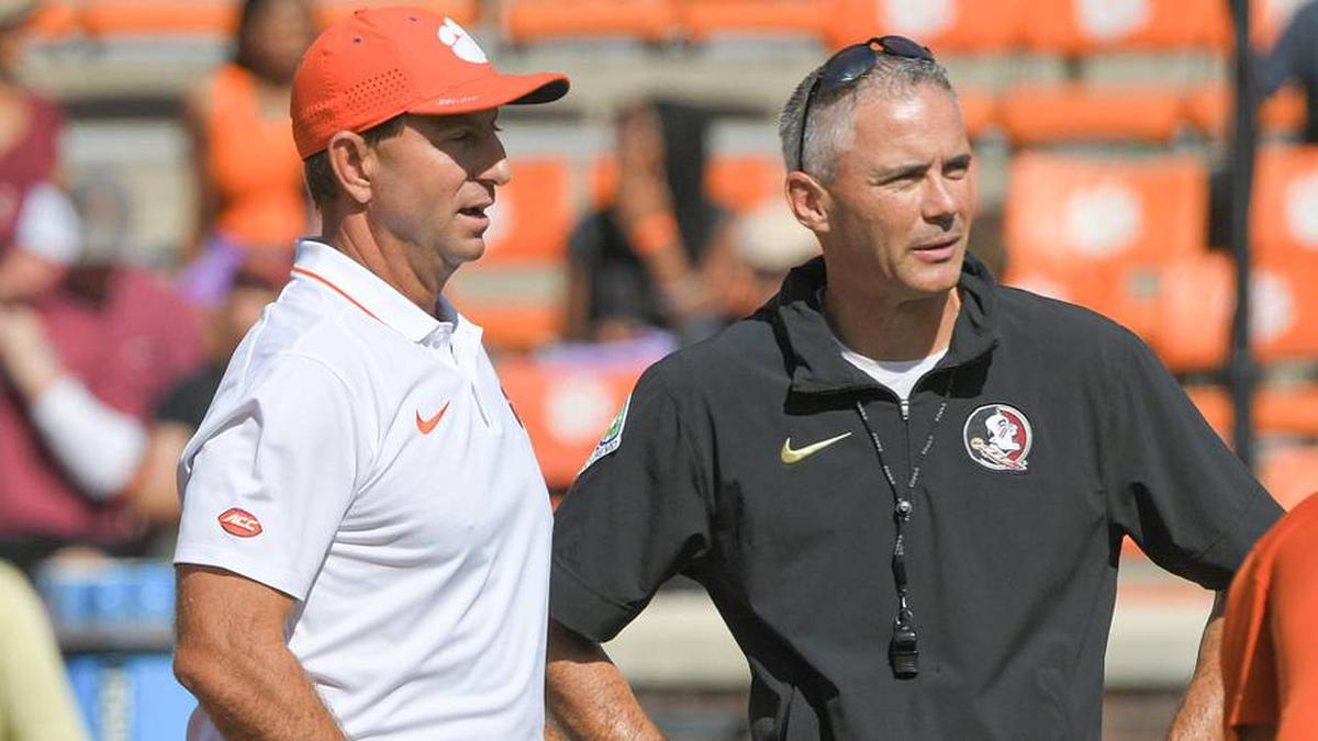  Sep 23, 2023; Clemson, South Carolina, USA; Clemson Tigers head coach Dabo Swinney and Florida State Seminoles head coach Mike Norvell before a game at Memorial Stadium. Mandatory Credit: Ken Ruinard-Imagn Images | Ken Ruinard-Imagn Images 