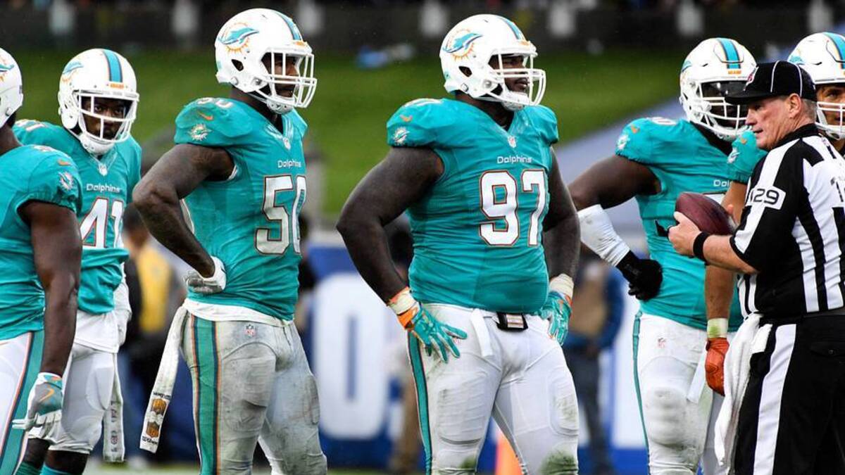  Miami Dolphins cornerback Byron Maxwell (41), defensive end Andre Branch (50) and defensive tackle Jordan Phillips (97) during the first half against the Los Angeles Rams at Los Angeles Memorial Coliseum in the 2016 season. | IMAGN IMAGES via Reuters Connect 