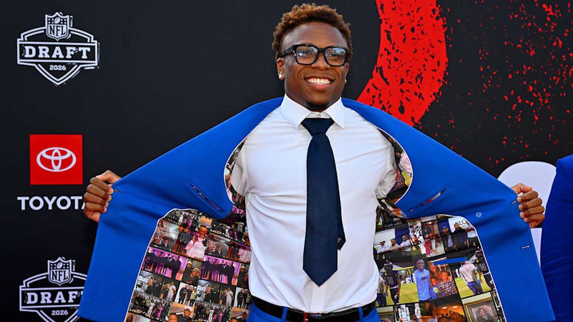  Hood wore a flashy blue jacket to the NFL draft on Thursday night. | Jason Miller/Getty Images 