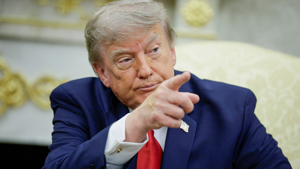 U.S. President Donald Trump points his finger as he participates in a bilateral meeting with Iraqi Prime Minister Ali al-Zaidi (not pictured) in the Oval Office at the White House in Washington, D.C., U.S., July 14, 2026. REUTERS/Evan Vucci