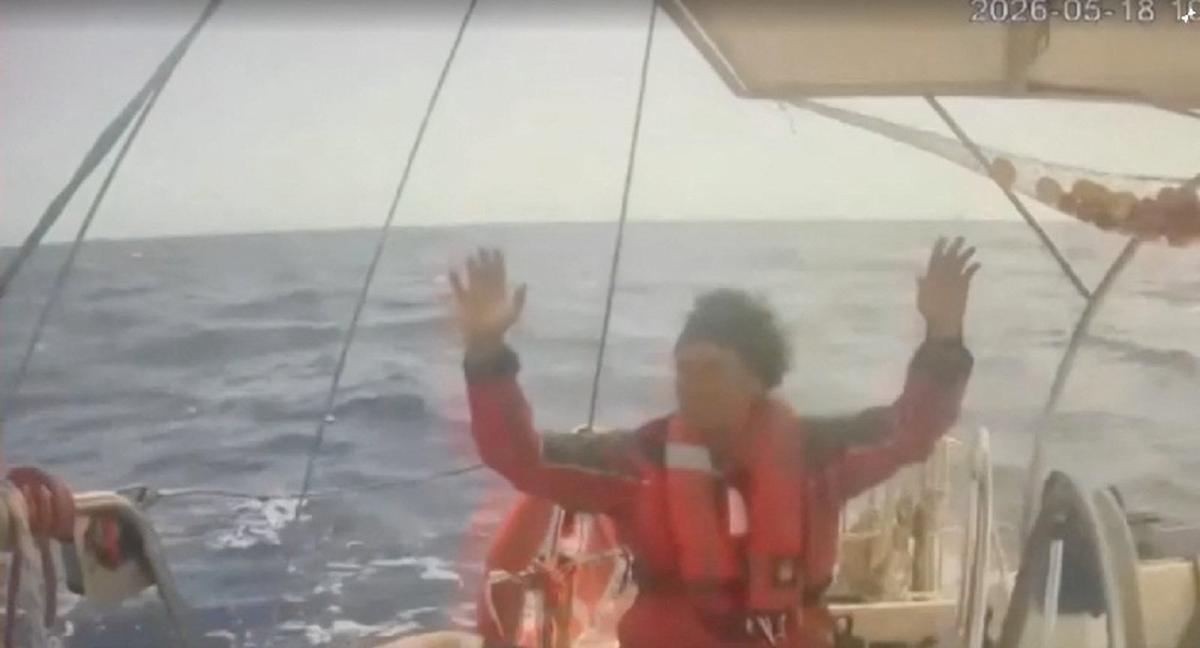 A person raises his hand as an Israeli naval boat intercepts the Global Sumud Flotilla en route to Gaza, in an attempt to deliver aid, at sea May 18, 2026, in this screengrab taken from a handout video. Global Sumud Flotilla/Handout via REUTERS