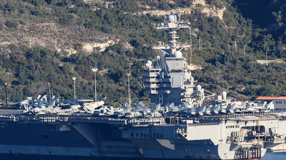 U.S. aircraft carrier USS Gerald Ford is pictured docked at Souda Bay in the Greek Mediterranean island of Crete, on Feb. 24, 2026. (Costas Metaxakis/AFP/Getty Images/TNS)