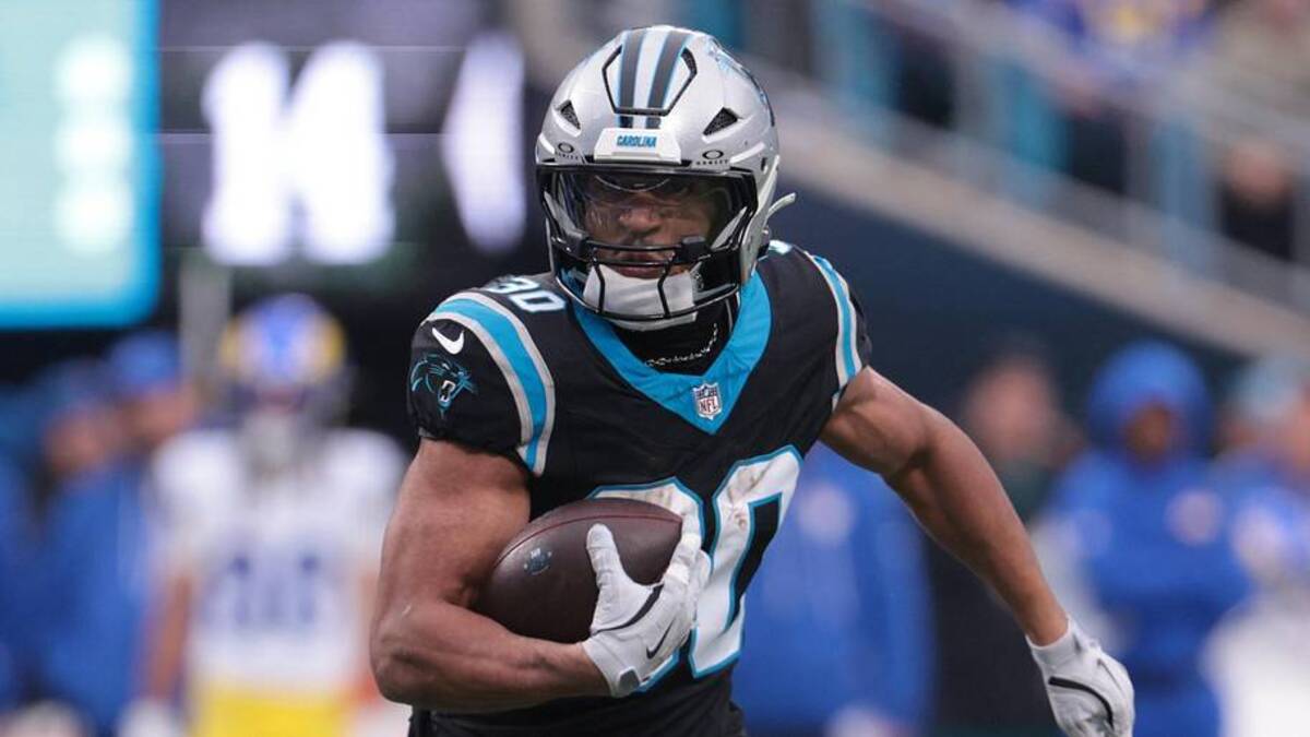  Carolina Panthers running back Chuba Hubbard (30) rushes during the second quarter against the Los Angeles Rams at Bank of America Stadium. | Scott Kinser-Imagn Images 