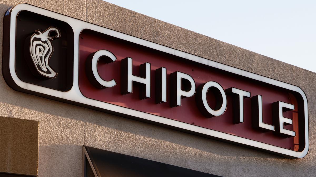 SAN DIEGO, CALIFORNIA - FEBRUARY 24: A Chipotle logo is displayed outside their restaurant on February 24, 2025 in San Diego, California. (Photo by Kevin Carter/Getty Images)
