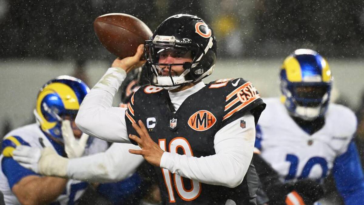  Chicago Bears quarterback Caleb Williams (18) throws a pass against the Los Angeles Rams during the third quarter of an NFC Divisional Round game at Soldier Field. | Matt Marton-Imagn Images 