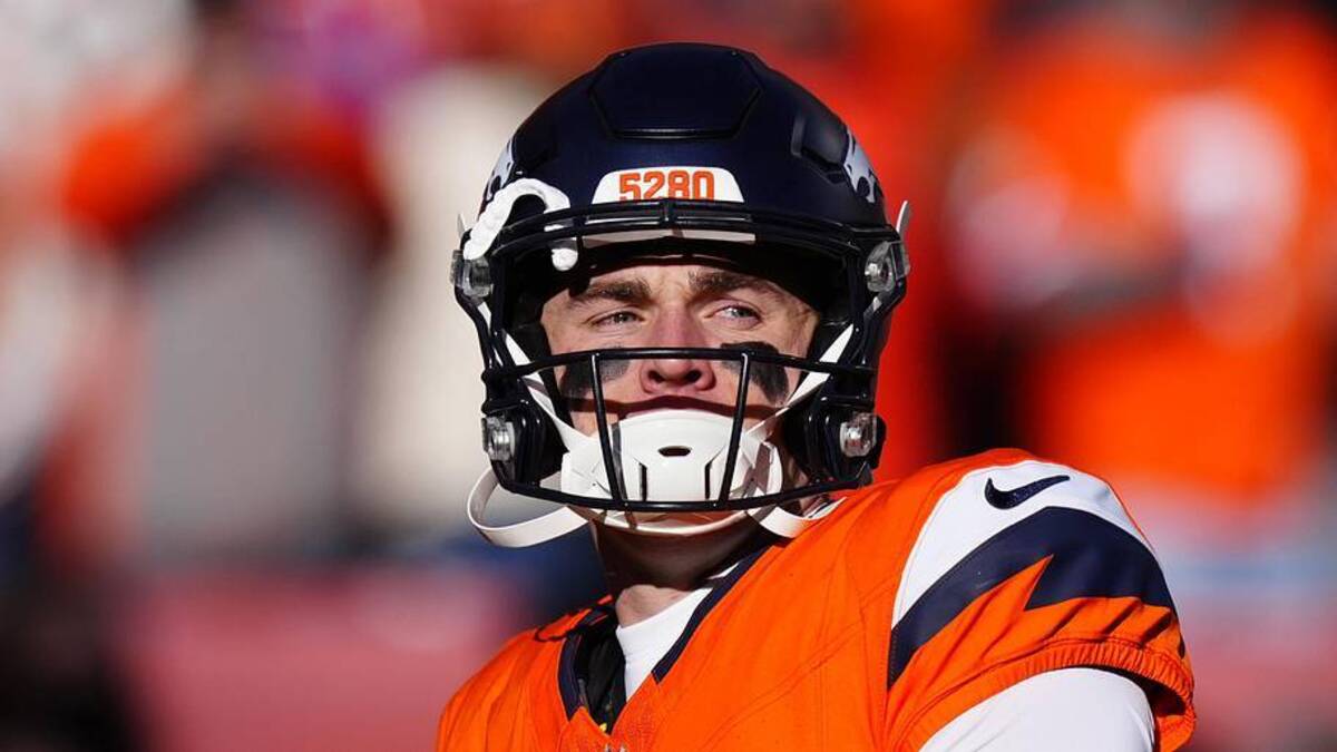  Jan 17, 2026; Denver, CO, USA; Denver Broncos quarterback Bo Nix (10) warms up before an AFC Divisional Round playoff game against the Buffalo Bills at Empower Field at Mile High. Mandatory Credit: Ron Chenoy-Imagn Images | Ron Chenoy-Imagn Images 