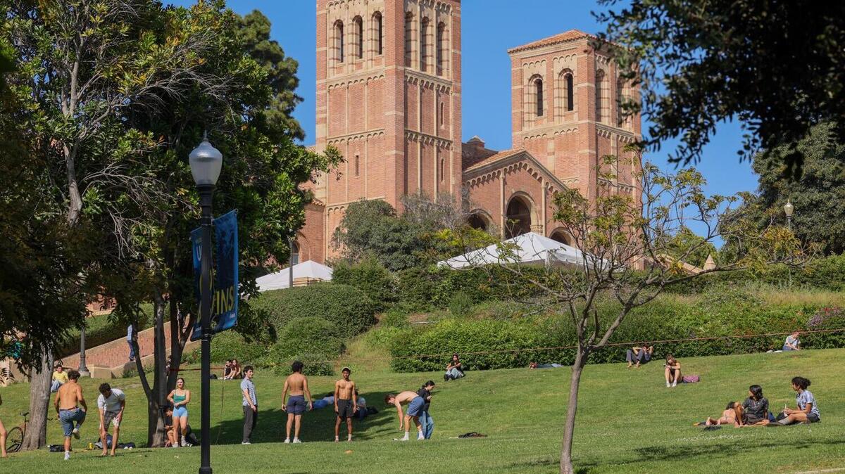 Los Angeles, CA - April 08: Students congregate and lay on grass near Dickson Court at University of California, Los Angeles on Wednesday, April 8, 2026 in Los Angeles, CA. (Ronaldo Bolanos / Los Angeles Times