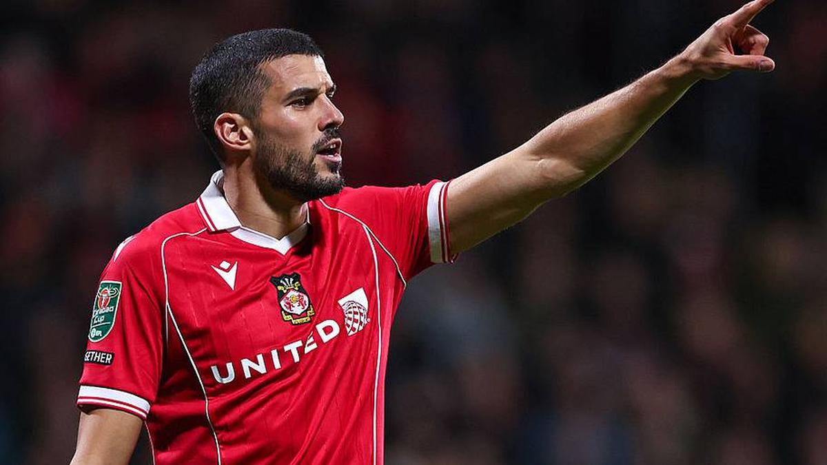  Conor Coady's final Wrexham appearance came in the League Cup loss to Cardiff City. | Robbie Jay Barratt - AMA/Getty Images 