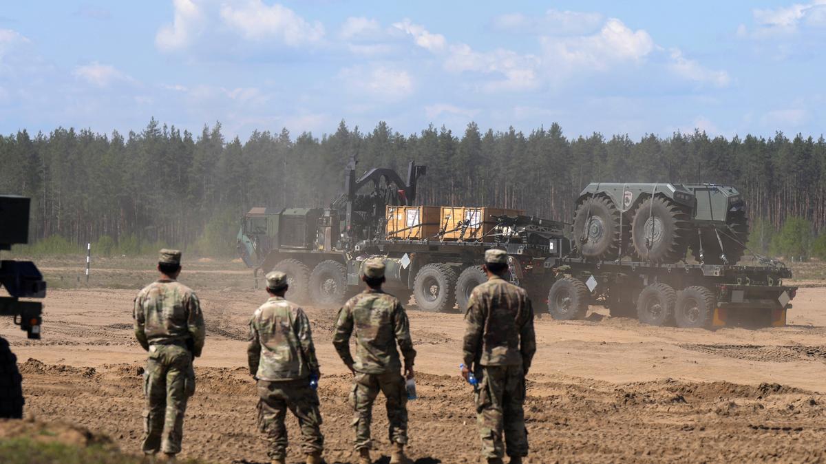 U.S. Army unmaned ground vehicles (UGV) are delivered to the area during NATO tests of the new counter-drone technologies in Pabrade training area, Lithuania May 15, 2026. REUTERS/Ints Kalnins