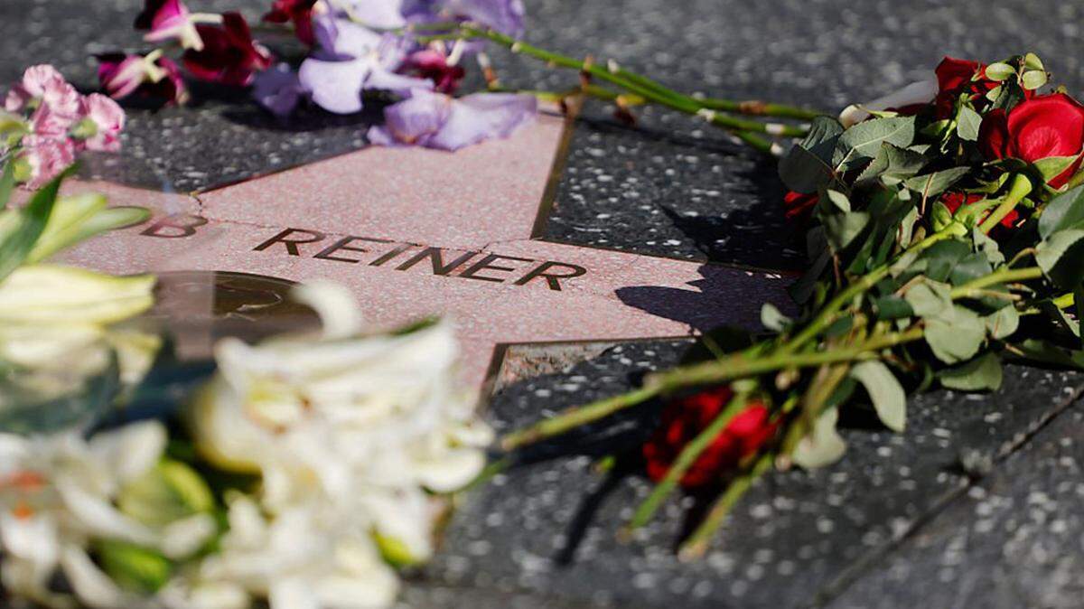 Flowers rest on director and actor Rob Reiner's star on the Hollywood Walk of Fame in Los Angeles on Monday.
