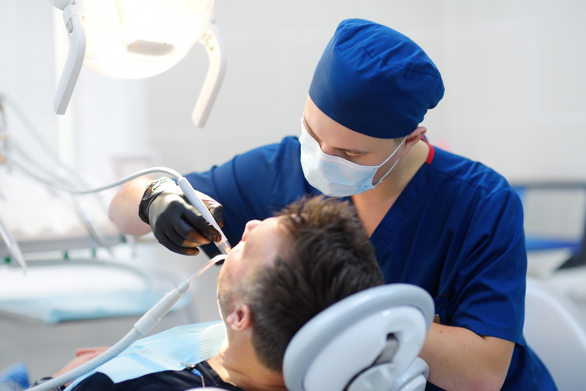  A stock image of a dentist and patient at medical center. 