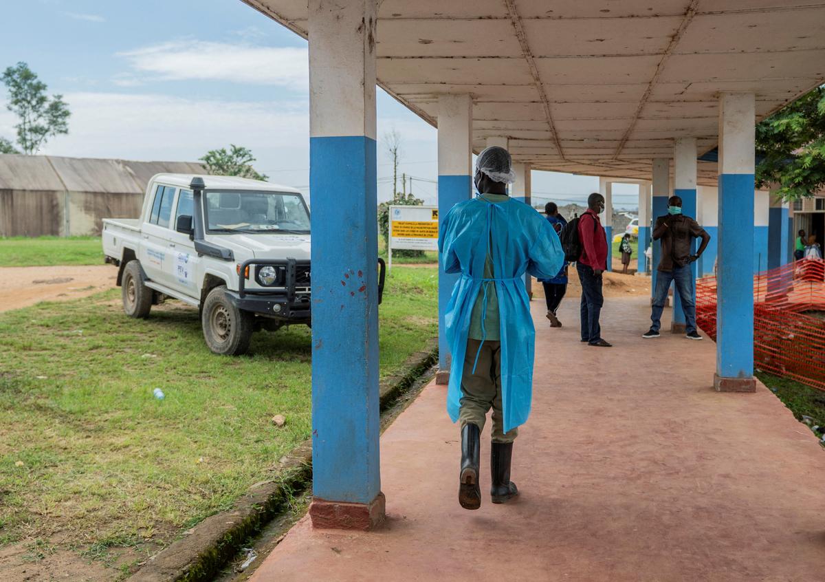 A healthcare worker walks at the Bunia General Referral Hospital following a resurgence of Ebola involving the Bundibugyo strain, a rarer variant of the virus with no approved vaccine currently available, in Bunia, Ituri province of the Democratic Republic of Congo May 21, 2026. REUTERS/Stringer