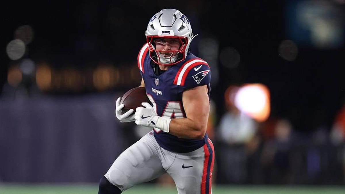  Aug 8, 2025; Foxborough, Massachusetts, USA; New England Patriots running back Lan Larison (34) runs the ball during the second half against the Washington Commanders at Gillette Stadium. Mandatory Credit: Paul Rutherford-Imagn Images | Paul Rutherford-Imagn Images 
