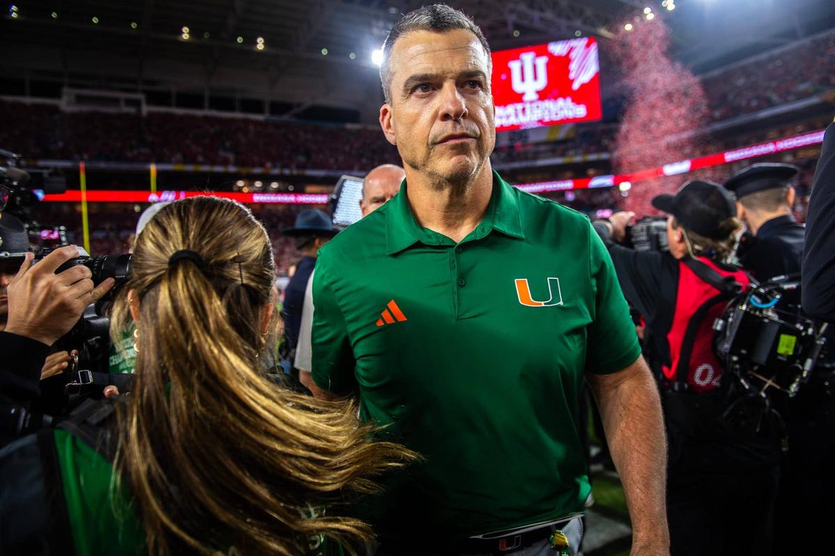  Miami Head Coach Mario Cristobal heads off the field after the College Football Playoff National Championship college football game at Hard Rock Stadium in Miami Gardens on Monday, Jan. 19, 2026. © Rich Janzaruk/Herald-Times / USA TODAY NETWORK via Imagn Images