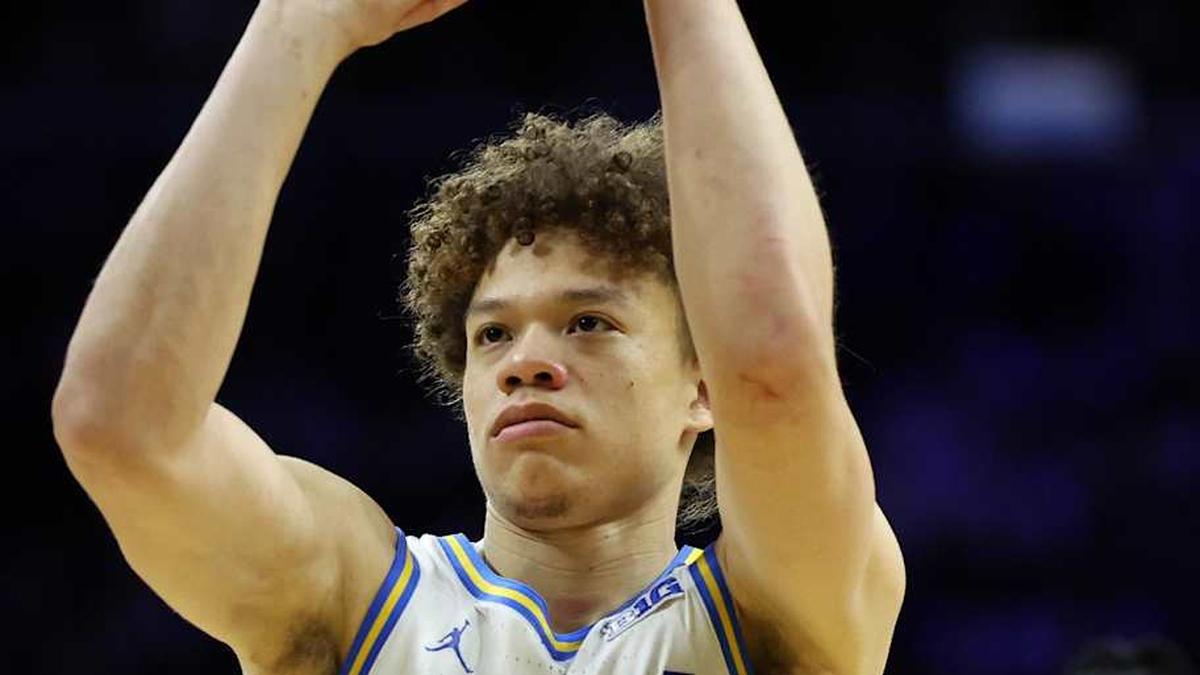  Mar 20, 2026; Philadelphia, PA, USA; UCLA Bruins guard Trent Perry (0) shoots the ball in the second half during a first round game of the men's 2026 NCAA Tournament at Xfinity Mobile Arena. Mandatory Credit: Bill Streicher-Imagn Images | Bill Streicher-Imagn Images 