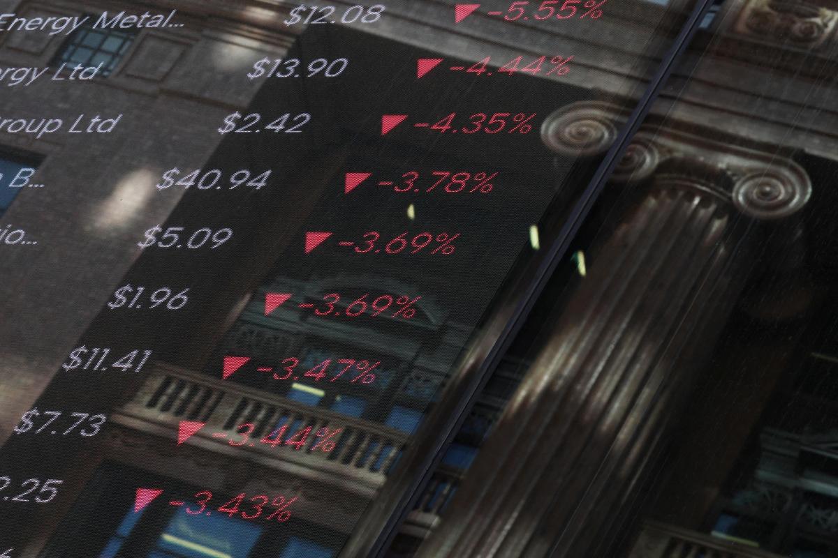 Stock prices are displayed on a market board at the Australian Securities Exchange, in Sydney, Australia, April 20, 2026. REUTERS/Hollie Adams