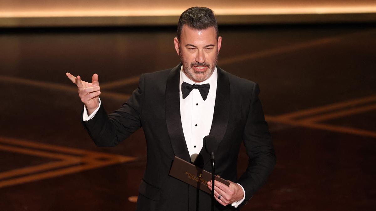 US television host Jimmy Kimmel presents the award for Best Documentary Short Film onstage during the 98th Annual Academy Awards at the Dolby Theatre in Hollywood, California on March 15, 2026. (Patrick T. Fallon/AFP via Getty Images/TNS)