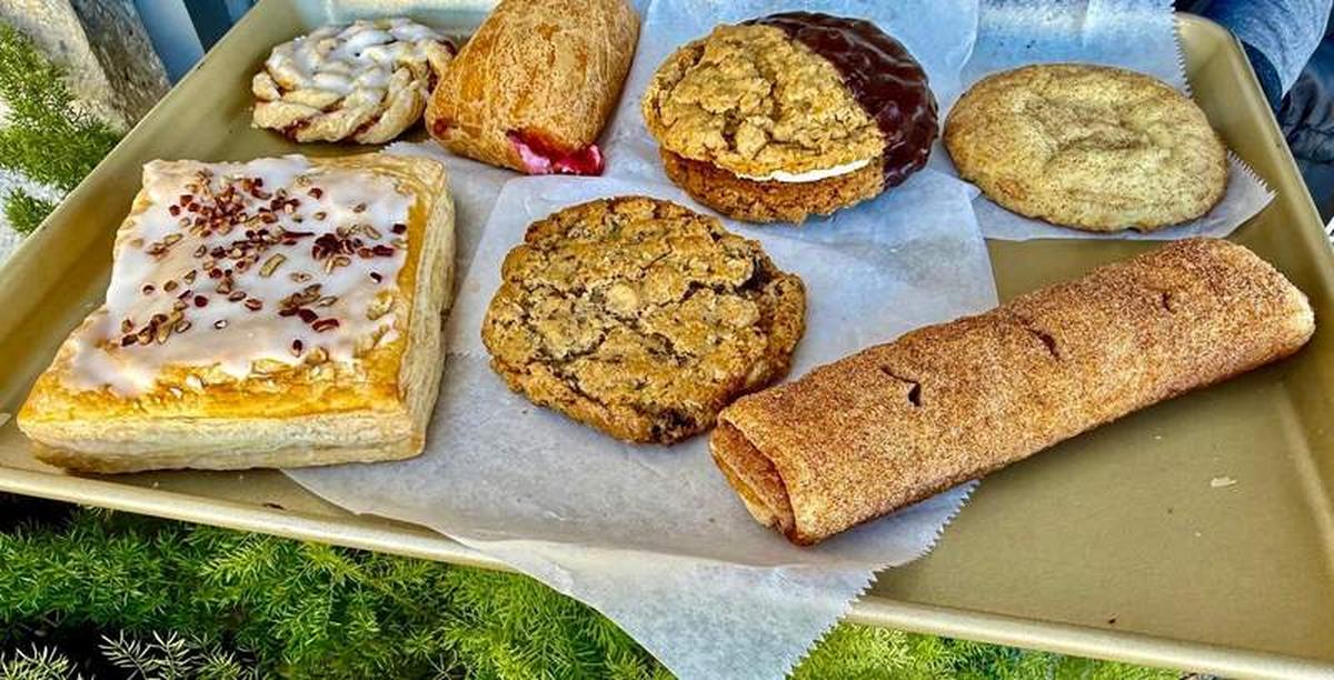  Way more than enough sweets for one! Shareable tray to nibble on a Main Street bench, with leftovers for later from Pritzker’s in downtown Fredericksburg. Photo credit: Christine Tibbetts. 