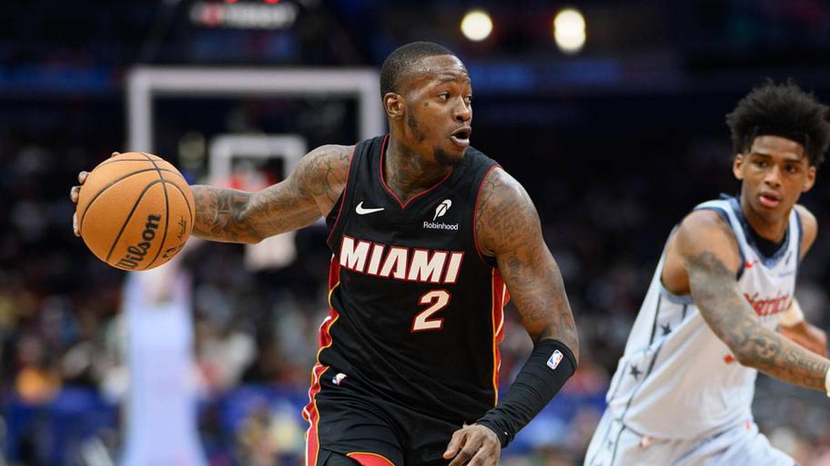  Mar 31, 2025; Washington, District of Columbia, USA; Miami Heat guard Terry Rozier (2) drives to the basket against Washington Wizards guard AJ Johnson (5) during the first quarter at Capital One Arena. Mandatory Credit: Reggie Hildred-Imagn Images | Reggie Hildred-Imagn Images 