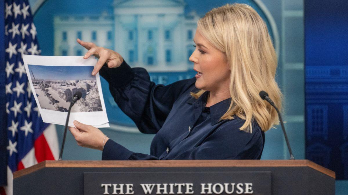 White House Press Secretary Karoline Leavitt shows off some of the ballroom design plans.