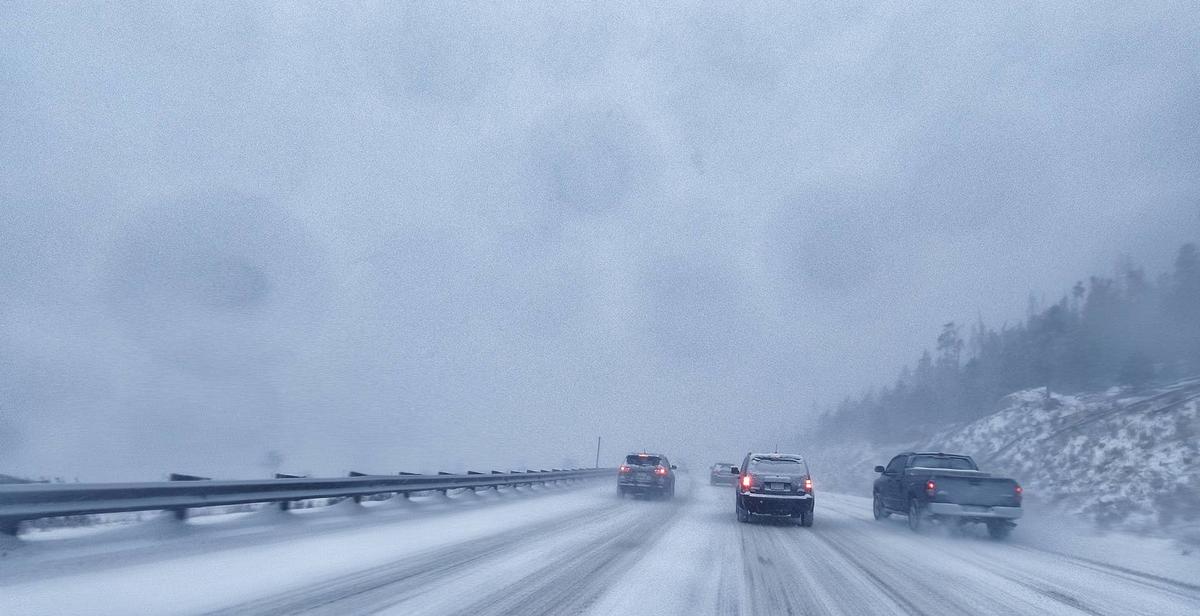  Cars in a winter snowstorm. Getty Images