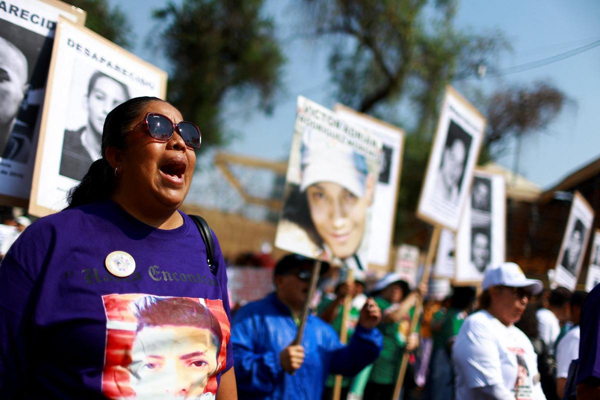 Collectives and families of the disappeared march on Mother's day asking for support in their fight against impunity in Mexico ahead of the 2026 FIFA World Cup, in Mexico City, Mexico May 10, 2026. REUTERS/Raquel Cunha
