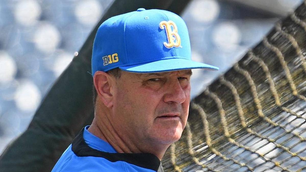  Jun 14, 2025; Omaha, Neb, USA; UCLA Bruins head coach John Savage watches the team warm up before the game against the Murray State Races at Charles Schwab Field. Mandatory Credit: Steven Branscombe-Imagn Images | Steven Branscombe-Imagn Images 